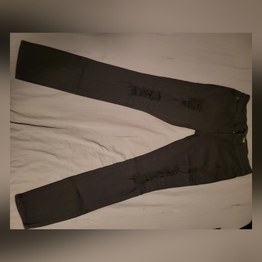 Express distressed black skinny jeans